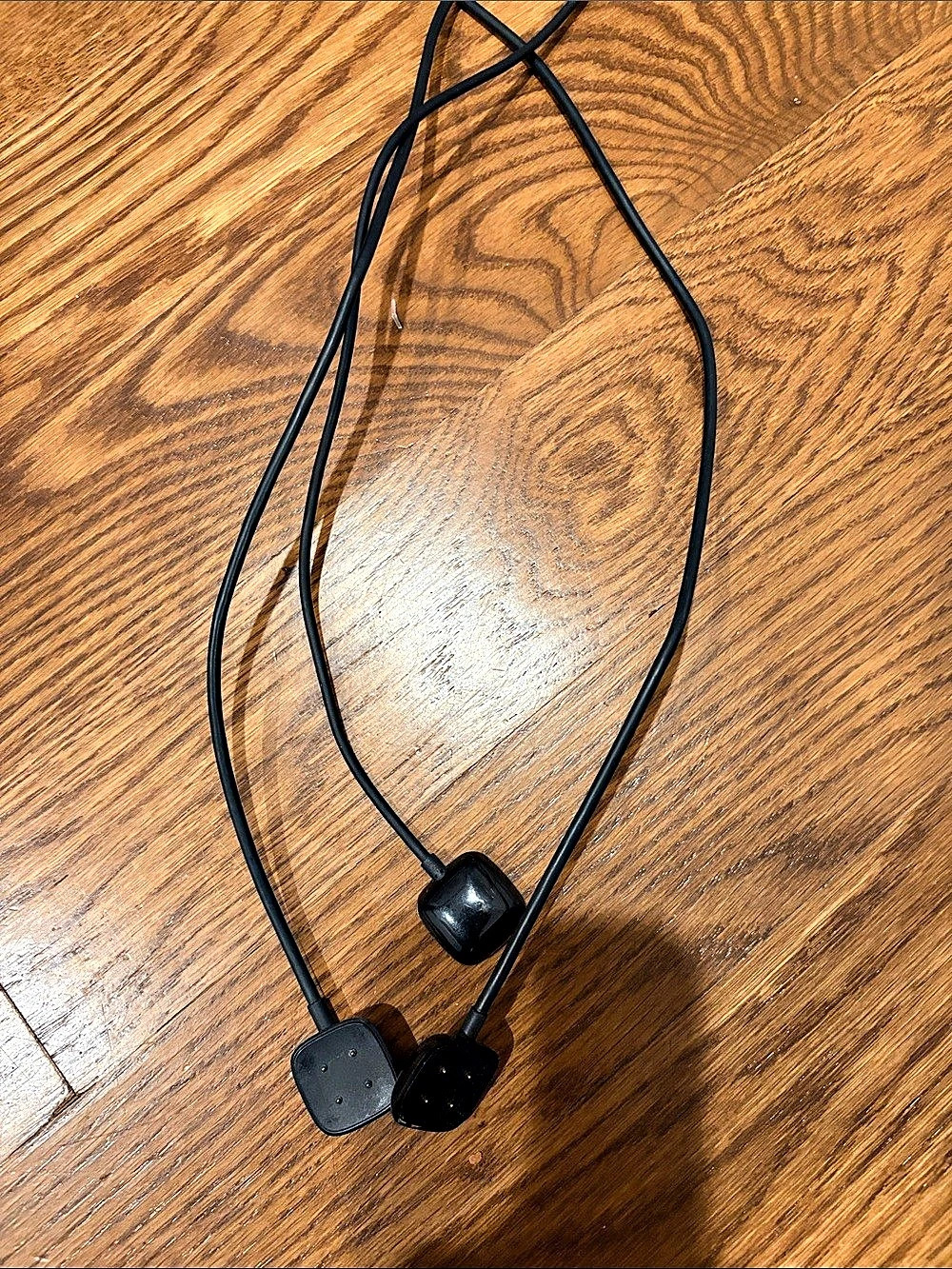 3 Black Fitbit versa 4 watch charger